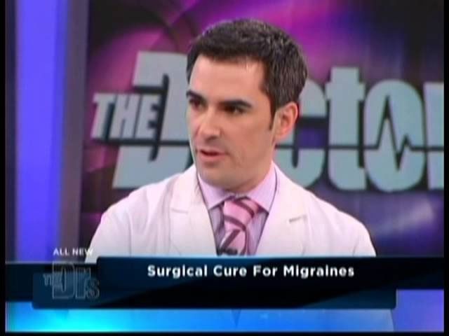 Doctor discussing surgical migraine treatment options.