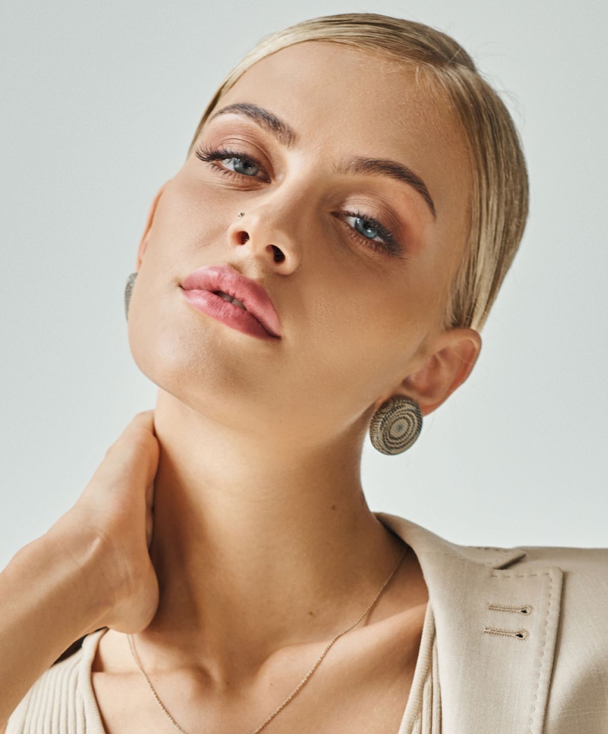 Portrait of a woman with stylish earrings.