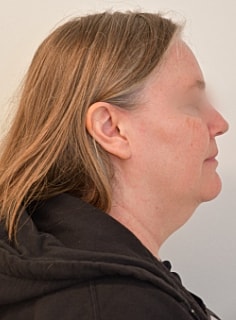 Profile of a woman with long hair.