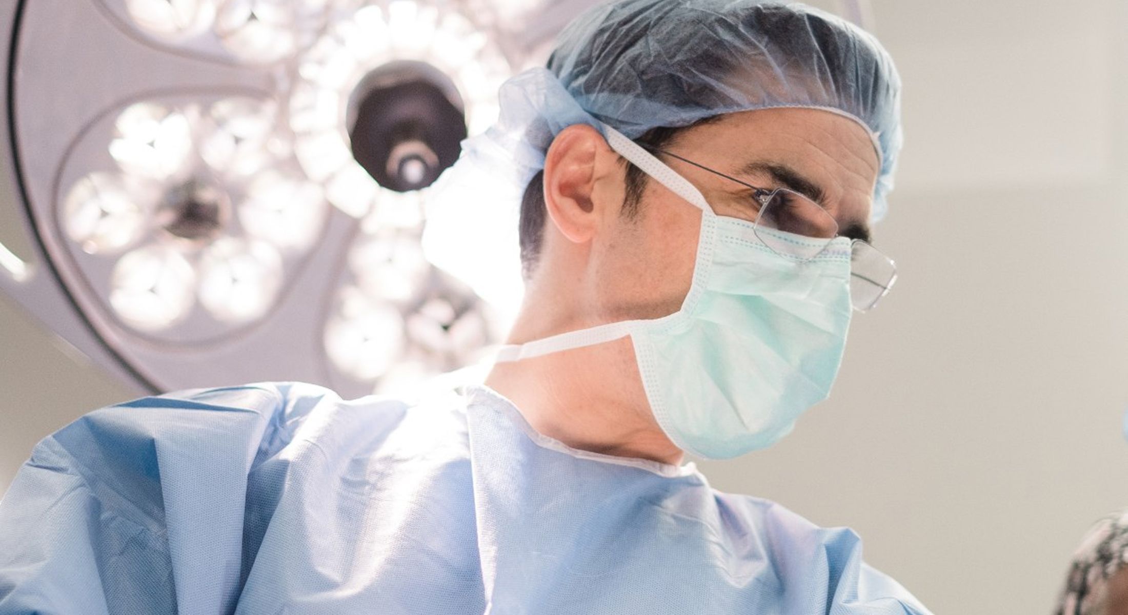 San Francisco skyline at sunset, vibrant city lights.