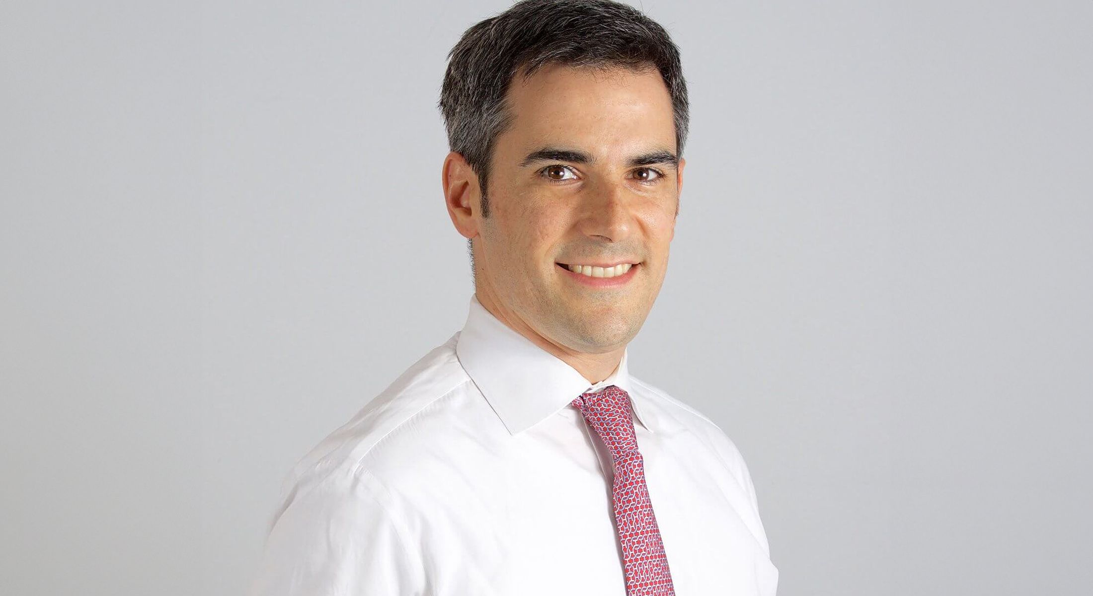 Bay Bridge with San Francisco skyline in backdrop.